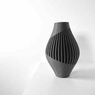 3D printed black vase with modern slit design, perfect for contemporary home decor.