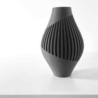 Elegant black vase with slatted pattern, ideal for contemporary home or office decor accents.