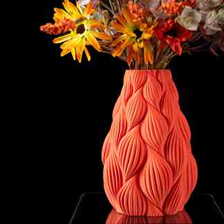 Colorful ceramic vase with intricate textured design for home decor.