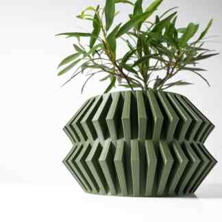 3D-printed plant pot with intricate geometric design, showcasing advanced 3D printing technology.