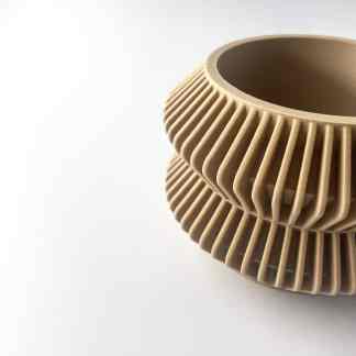 High-quality 3D printed beige gear with intricate, detailed design for engineering and manufacturing projects.