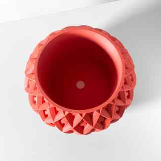 Detailed 3D printed red bamboo vase with geometric diamond design, exemplifying innovative 3D printing technology.