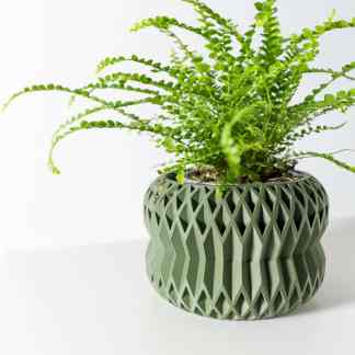 Vase with detailed geometric pattern, perfect for showcasing small indoor plants and succulents.