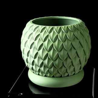 3D printed decorative green vase with intricate geometric design for modern home decor.