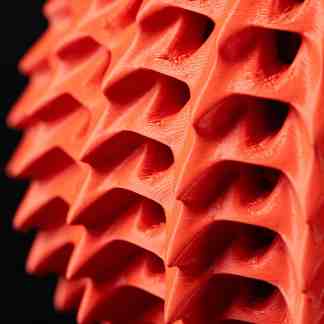 High-resolution 3D-printed lattice model showcasing complex geometric patterns and precision manufacturing techniques.
