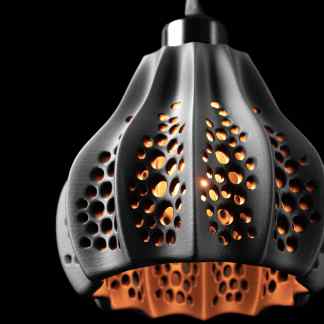 Elegant 3D printed lighting fixture featuring perforated black design and warm interior lighting, ideal for modern interiors.