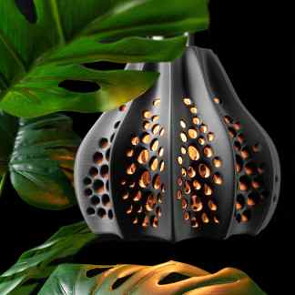 Decorative black 3D printed lamp featuring perforated design, perfect for modern home decor.