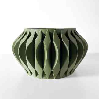 3D printed green vase with intricate geometric design, highlighting innovative 3D printing craftsmanship.
