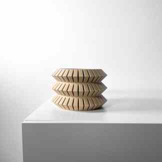 Elegant 3D-printed wooden vase with detailed geometric pattern, perfect for modern decor and artistic expressions.