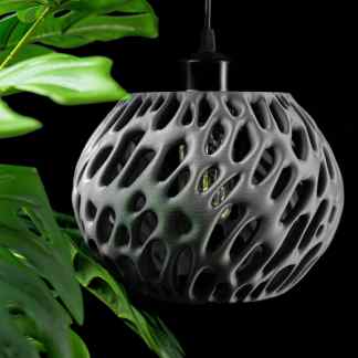 3D printed lamp with intricate, organic design showcased in a contemporary interior setting.