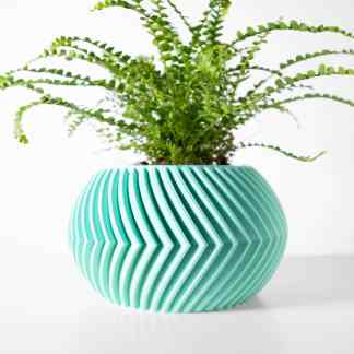 Vibrant teal SOKO planter with textured geometric design, perfect for modern indoor decor.
