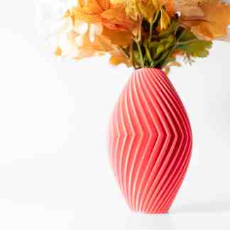 Colorful 3D printed vase with flowers, showcasing innovative design and craftsmanship from AM Square 3D.