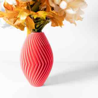 Vibrant red 3D-printed vase showcasing intricate geometric patterns for contemporary home decoration.