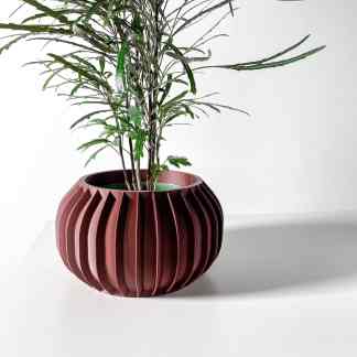High-quality SORA planter with ribbed texture, perfect for contemporary home decor and plant display.