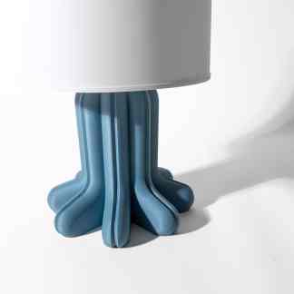 Highly detailed 3D printed lamp base in blue with modern design, showcasing advanced additive manufacturing techniques.