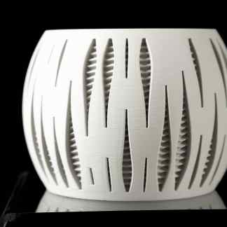 High-quality 3D printed modern lamp with intricate cut-out patterns for stylish lighting.
