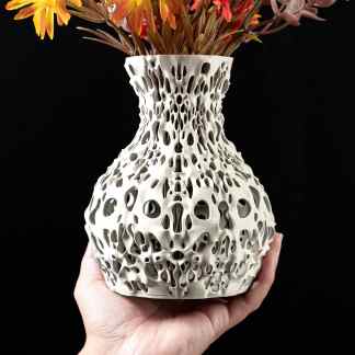 Unique 3D-printed ceramic vase showcasing innovative design for modern decor.