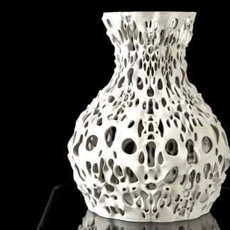 Stunning 3D-printed decorative vase with complex hollow design, created by AM Square 3D.