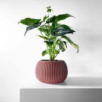 High-quality 3D rendering of a lush green indoor plant in a stylish pink ribbed ceramic pot.