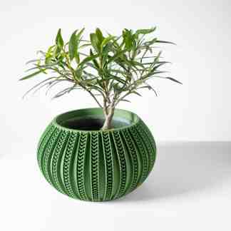 Detailed 3D-printed green decorative planter showcasing advanced manufacturing technology.