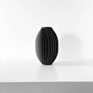 Sleek black 3D-printed vase with modern design, perfect for contemporary interior decor and stylish home accents.