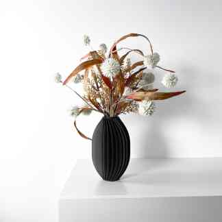 3D printed vase with flowers, perfect for stylish home or office decor.
