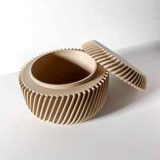 A stylish, functional storage box with textured ridges and removable lid for versatile use.