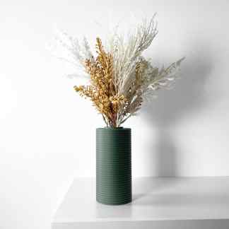 Dried flower bouquet with beige and white accents in a chic green textured vase for contemporary interior style.
