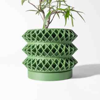 3D printed green plant pot with intricate lattice pattern for stylish indoor gardening.