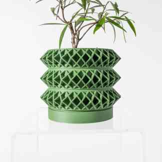 High-resolution image of a modern, geometric 3D-printed plant pot in vibrant green, showcasing innovative design and craftsmanship.