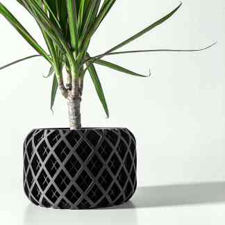 3D printed black geometric plant pot for stylish home decor and indoor plants.
