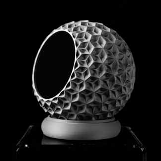 High-resolution black and white image of a 3D-printed geometric sphere with intricate patterns.