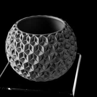 3D printed vase with detailed geometric surface design, modern home decor.