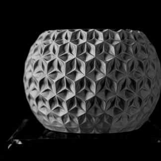 Intricate geometric 3D printed design with detailed patterns.