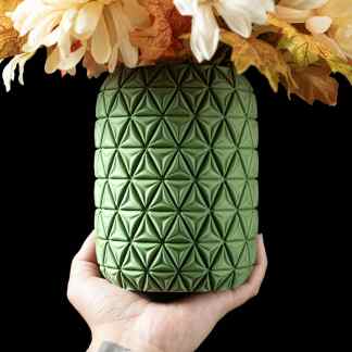 Green 3D textured vase with floral design, perfect for modern home decor and flower arrangements.