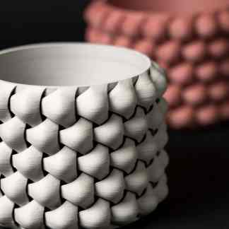 Unique 3D woven planter with stylish design for indoor and outdoor decor. Durable, modern, handcrafted, versatile for plants.
