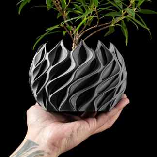 3D printed plant holder, modern decor, intricate lattice design, innovative home accessories.