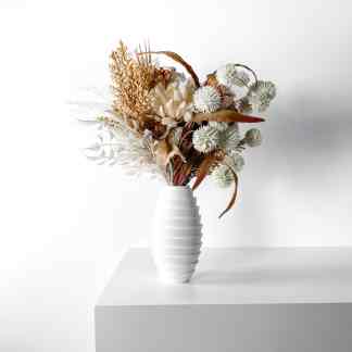 Elegant white 3D-printed vase showcasing dried floral arrangement for home decor.