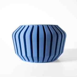 Colorful 3D-printed decorative container with unique vertical slats for modern home decor.