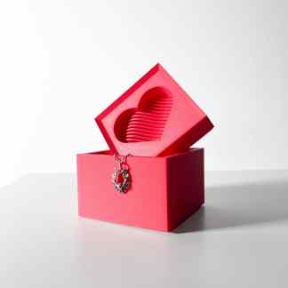 Red 3D-printed jewelry box with heart-shaped interior, perfect for jewelry presentation and gifting.