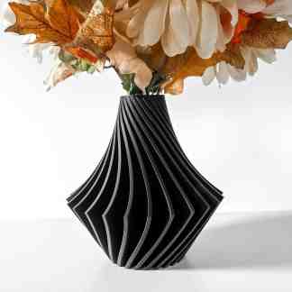 3D printed black vase with floral arrangement, modern home décor.