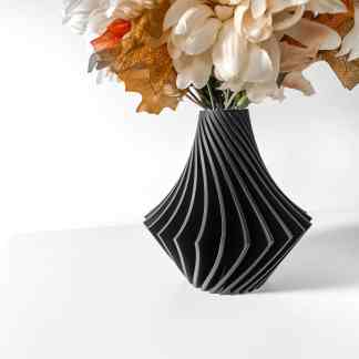 Vase with modern black 3D printed design showcasing intricate spiral patterns for stylish home accents.