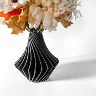 Elegant black modern vase with geometric striped pattern for versatile home decor.