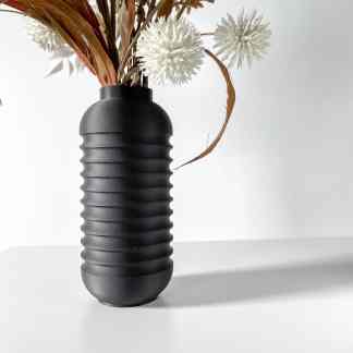 Elegant black 3D printed vase with textured design, perfect for contemporary interior accents.