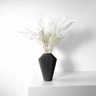 Black 3D-printed vase with complex geometric patterns, showcasing artistic design and durability.