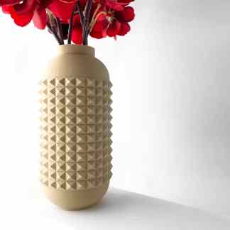 Vase with textured pyramid design, ideal for stylish home or office floral arrangements.