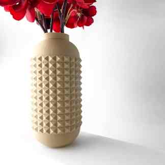 3D printed beige vase with textured geometric design for home decor or art projects.