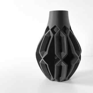 Stylish black 3D-printed Vesperi vase with geometric cutouts, perfect for contemporary home accents.