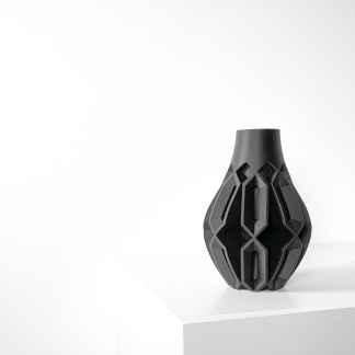 Elegant black 3D printed vase with geometric design, perfect for interior decor.