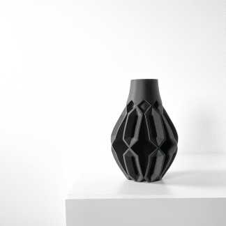 Sleek black geometric vase created with 3D printing technology, ideal for stylish interior decor.